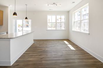 a kitchen and dining room in a new home